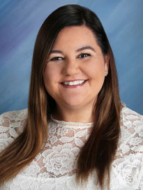 Dr. Heather Hergott wearing white blouse